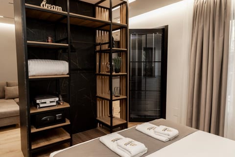 Bed, Library, flat iron, safe, towels, wardrobe