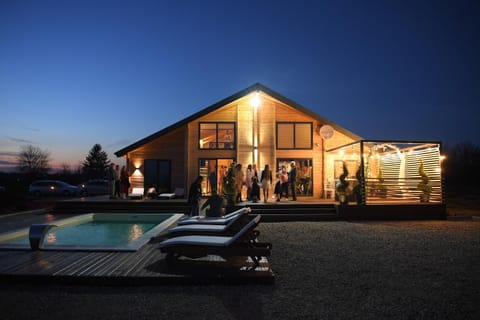 Property building, Night, Natural landscape, Pool view, Swimming pool, sunbed