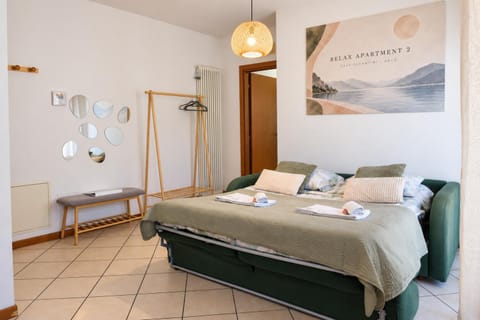 Bed, Living room, Decorative detail, Seating area, towels