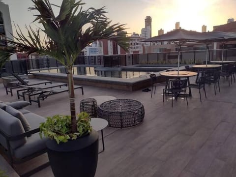 Restaurant/places to eat, Seating area, Swimming pool, Sunset
