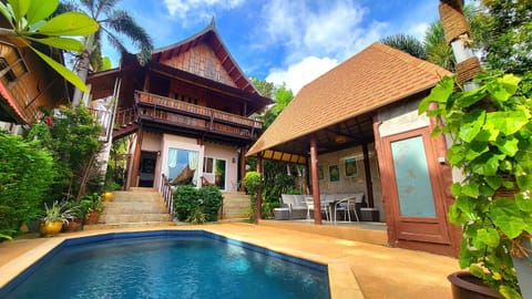 Property building, Garden, Dining area, Swimming pool