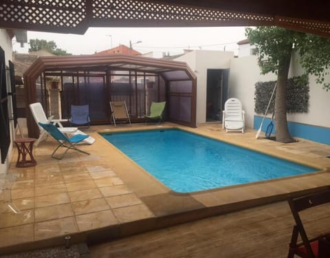 Property building, Living room, Swimming pool