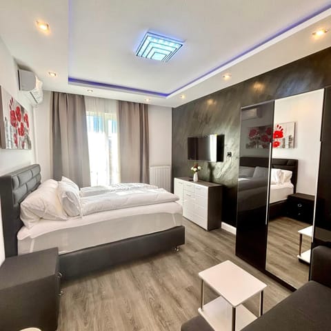 Bed, TV and multimedia, Bedroom, wardrobe, air conditioner