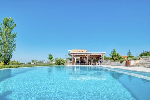 Property building, Living room, Swimming pool
