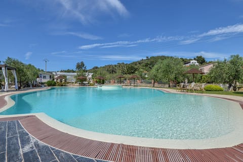 Property building, Living room, Swimming pool