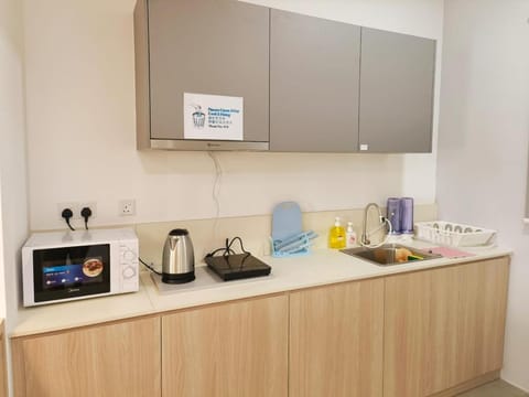 Kitchen or kitchenette, microwave