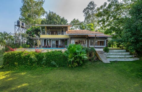 Property building, Facade/entrance, Spring, Day, Natural landscape, Garden, Garden view, Pool view, Swimming pool