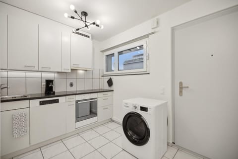 Kitchen or kitchenette, washing machine