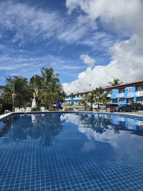 Property building, Day, Pool view, Swimming pool, sunbed
