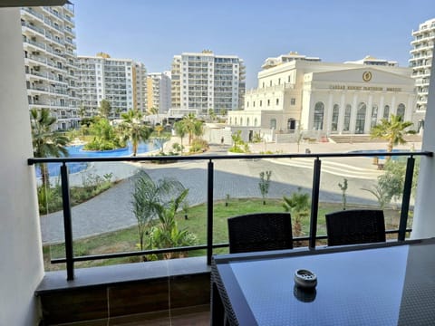 Property building, Patio, Day, View (from property/room), Balcony/Terrace, Dining area, City view, Pool view, Swimming pool
