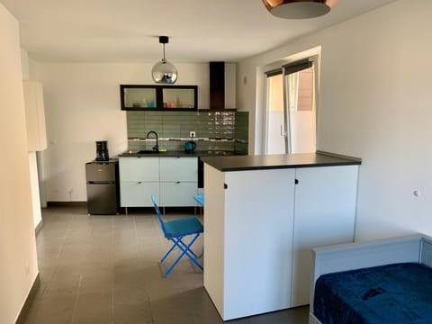 Dining area, minibar, stove