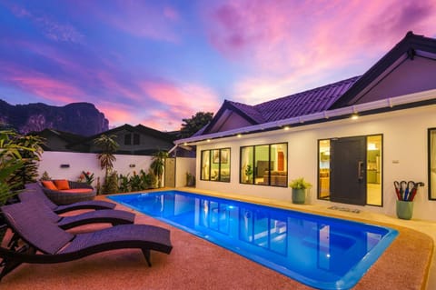 Property building, Night, Natural landscape, Mountain view, Pool view, Swimming pool, Sunset, sunbed