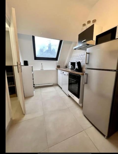 Kitchen or kitchenette, dishwasher, microwave, oven, stove, toaster