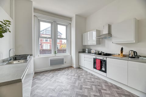 Kitchen or kitchenette, microwave, oven, stove, stove, kitchen, kitchen