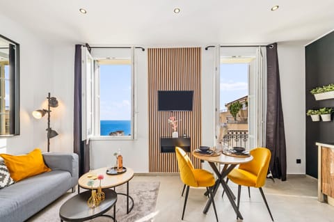 TV and multimedia, View (from property/room), Living room, Seating area, Sea view
