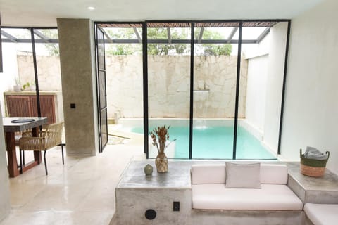 Living room, Seating area, Pool view, Swimming pool