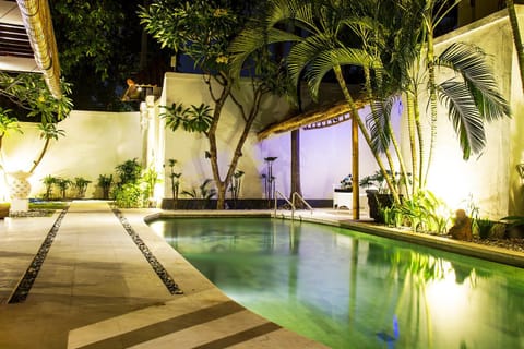 Property building, Patio, Night, Garden, Garden view, Pool view, Swimming pool
