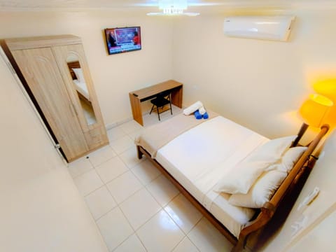 Bed, TV and multimedia, Bedroom, towels, wardrobe, air conditioner