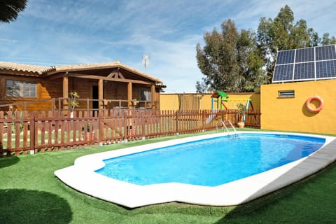 Property building, Living room, Swimming pool