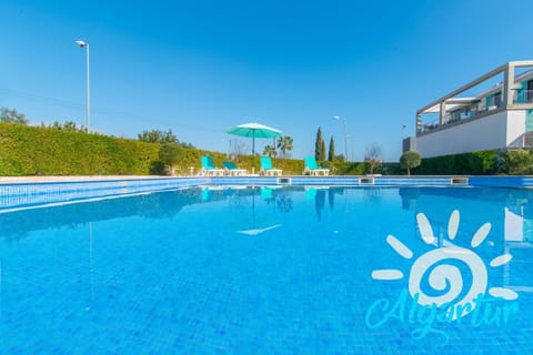 Swimming pool, sunbed