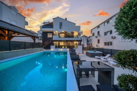 Property building, Pool view, Swimming pool, sunbed