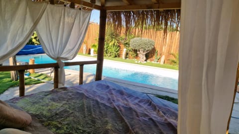 Property building, Living room, Swimming pool