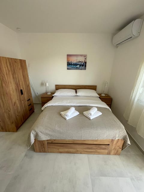 Bed, Bedroom, towels, wardrobe, air conditioner