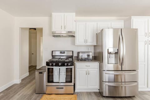 Kitchen or kitchenette, dishwasher, oven, stove, toaster