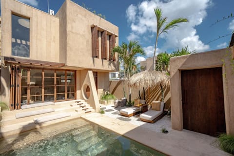 Property building, Day, Natural landscape, Pool view, Swimming pool, sunbed