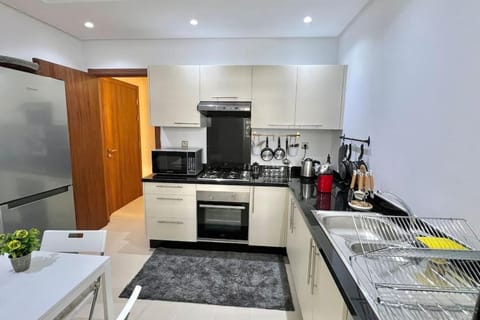 Kitchen or kitchenette, oven, stove