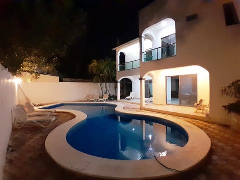 Property building, Patio, Pool view, Swimming pool, sunbed