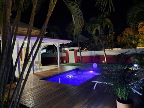 Patio, Night, Garden, Pool view, Swimming pool, sunbed