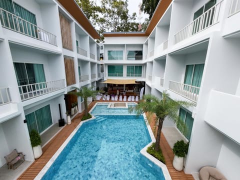 Property building, Patio, Day, View (from property/room), Balcony/Terrace, Pool view, Swimming pool, Swimming pool, sunbed