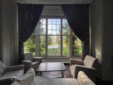 Living room, Seating area, Garden view