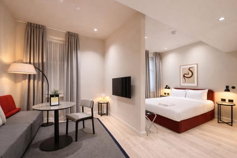 Bed, Living room, Seating area, Bedroom