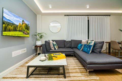TV and multimedia, View (from property/room), Living room, Seating area, Dining area, Evening entertainment