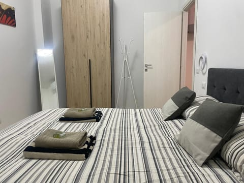 Bed, Photo of the whole room, Bedroom, towels, wardrobe