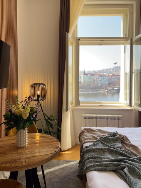 Bed, Seating area, Bedroom, River view