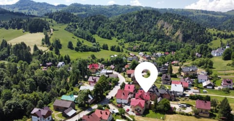Property building, Nearby landmark, Spring, Day, Neighbourhood, Natural landscape, Bird's eye view, Mountain view