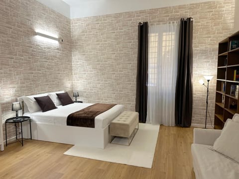 Bed, Library, Living room, Photo of the whole room, Seating area, Bedroom