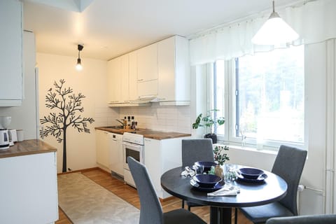 Dining area, stove, kitchen