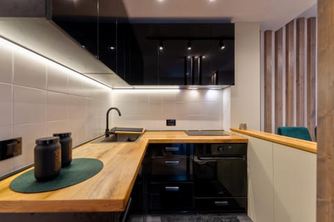 Kitchen or kitchenette, stove