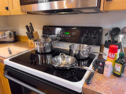 Kitchen or kitchenette, microwave, stove, toaster