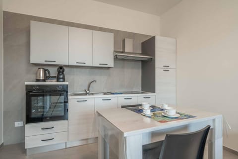 Kitchen or kitchenette, oven, stove