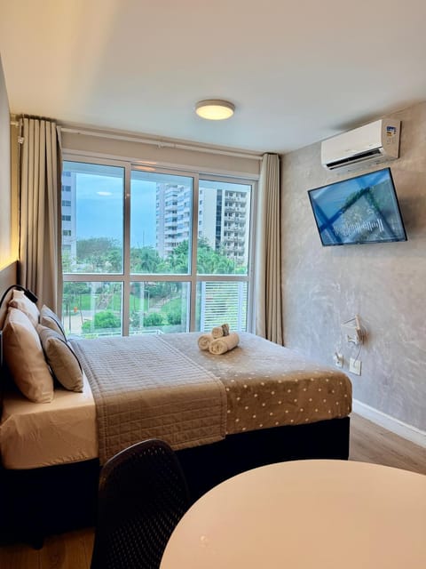 Bed, TV and multimedia, Bedroom, towels, air conditioner