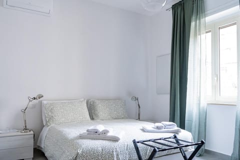 Bed, Photo of the whole room, Bedroom, towels, air conditioner