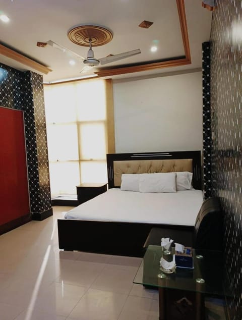 Bed, Photo of the whole room, Bedroom, towels, air conditioner