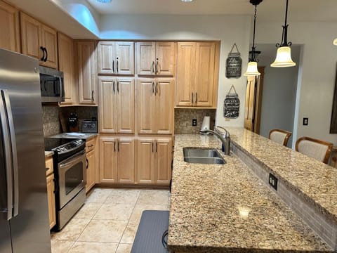 Kitchen or kitchenette, dishwasher, oven, stove, toaster