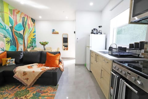 Kitchen or kitchenette, Living room, Seating area, Dining area, microwave, oven, stove, toaster