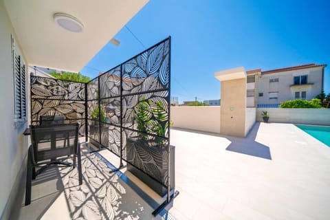 Patio, Day, Balcony/Terrace, Pool view, Swimming pool, sunbed